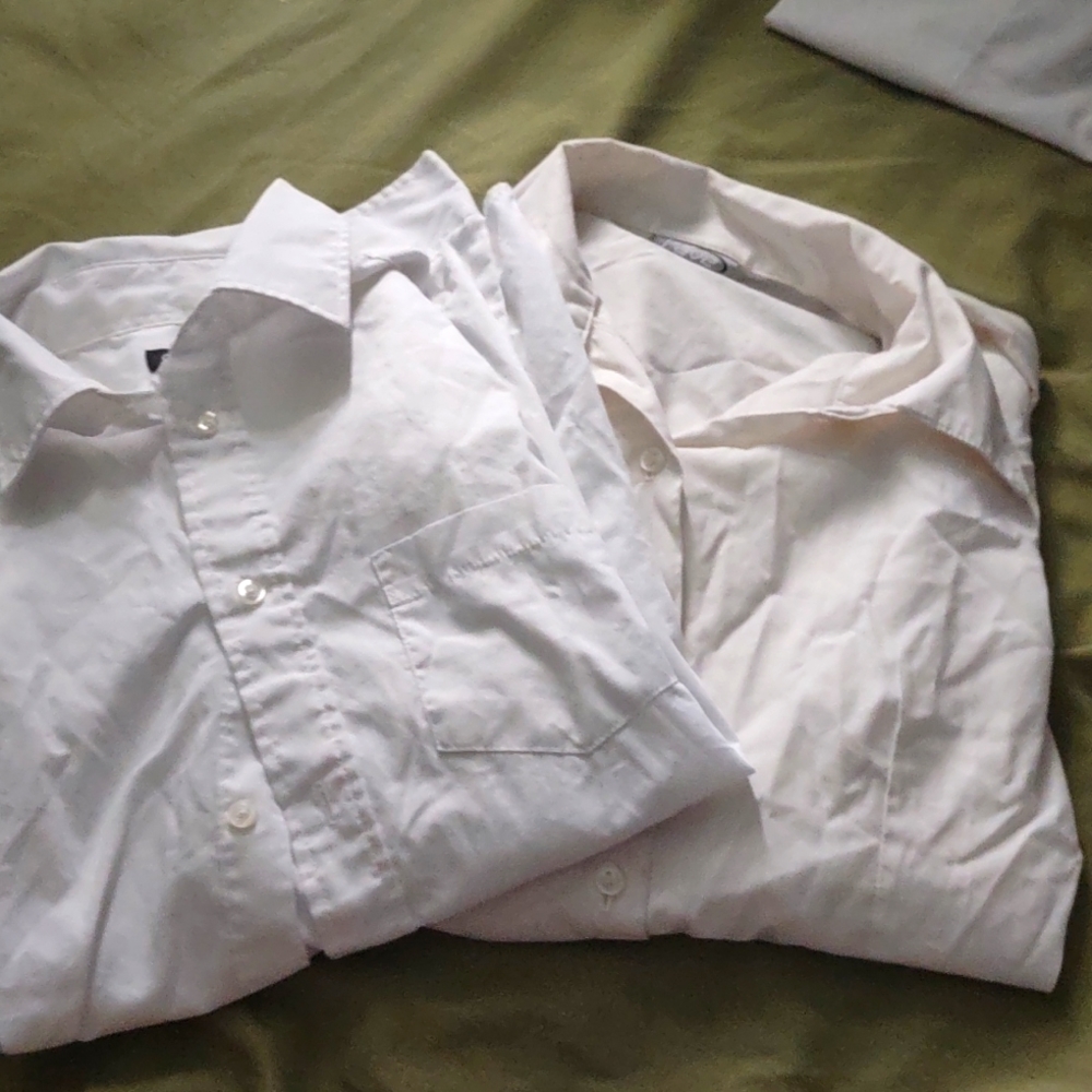 Two dress shirts two different brands rave and George.